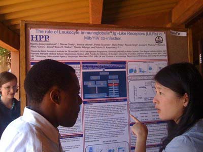 Students Discuss research during the poster session. 